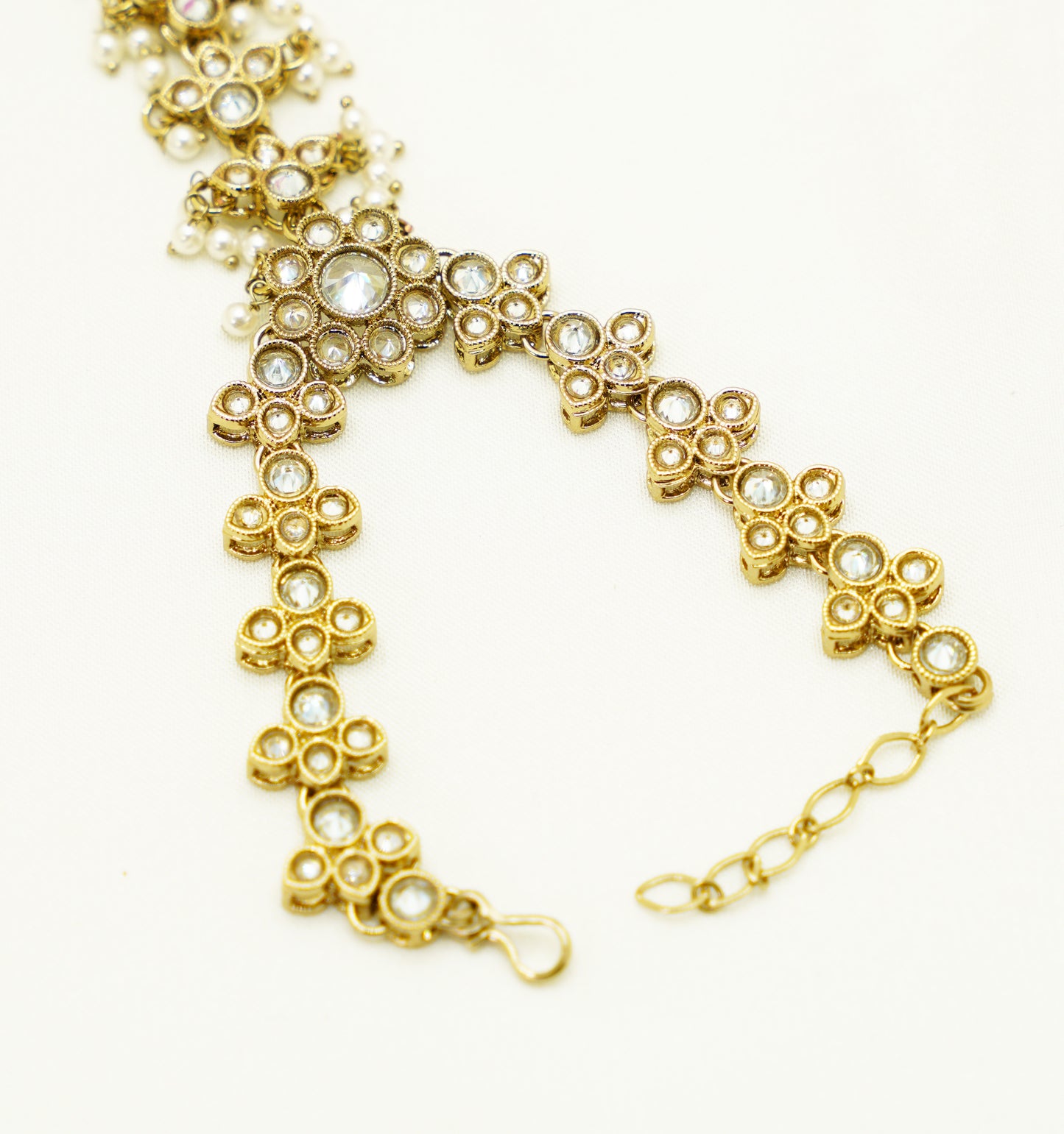 Traditional Bridal Hand Harness – Gold Pearl Haathphool with Finger Ring for Weddings & Mehndi