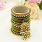 Green & Gold Bridal Bangles with Kundan Detailing and Jhumka Tassel – 22-Piece Party Set